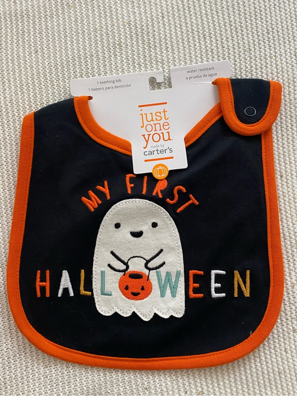 Carter’s first Halloween bib